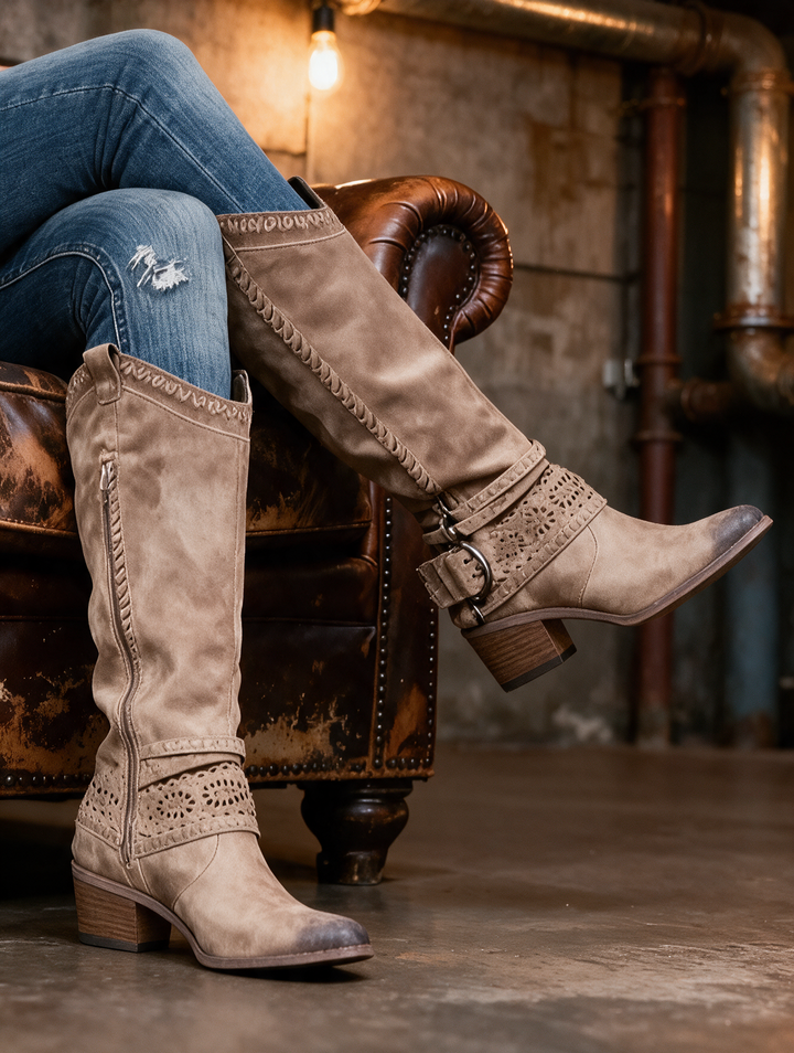 Slouched western boots with harness strap