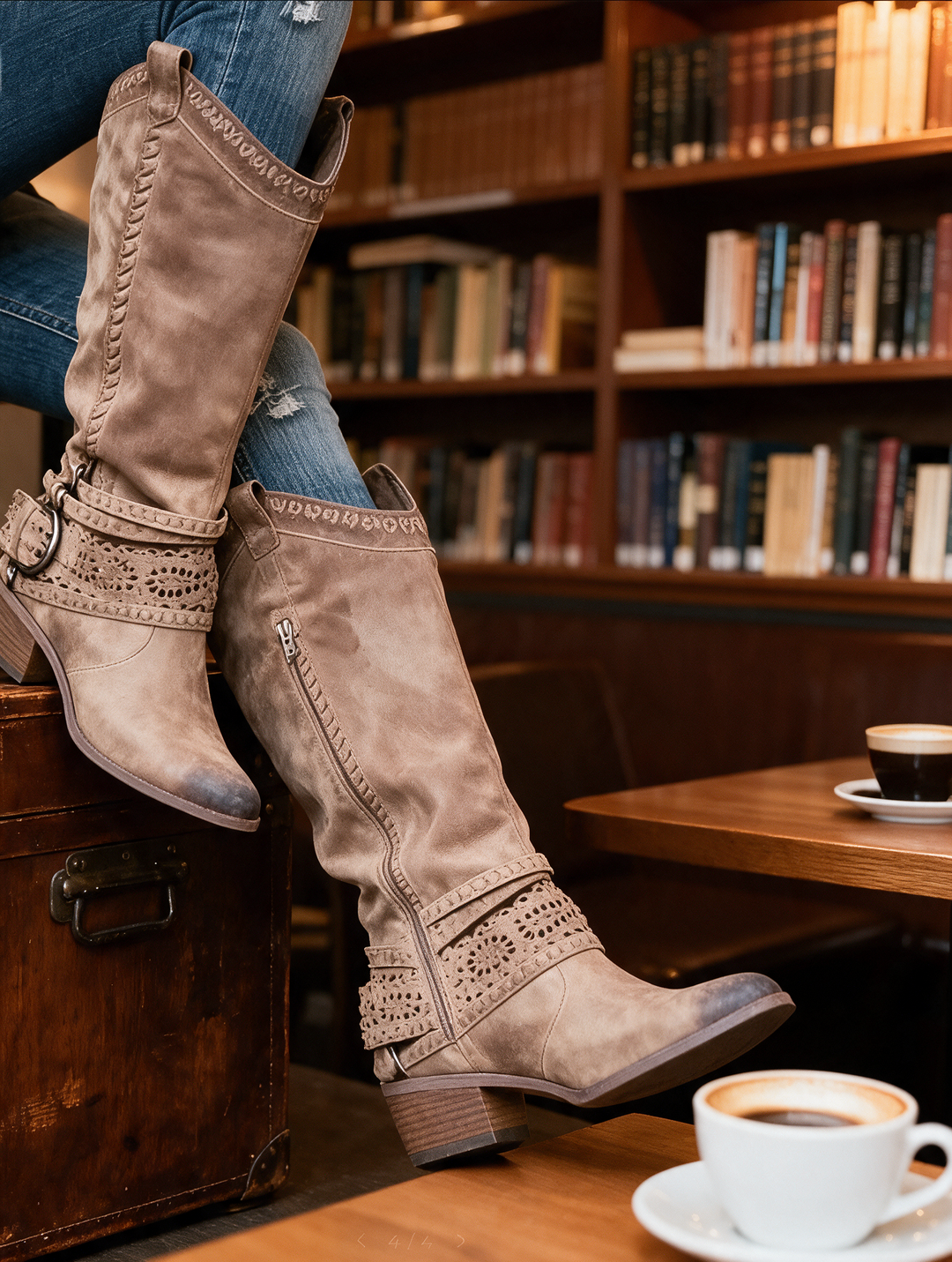 Slouched western boots with harness strap