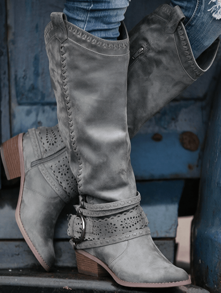 Slouched western boots with harness strap