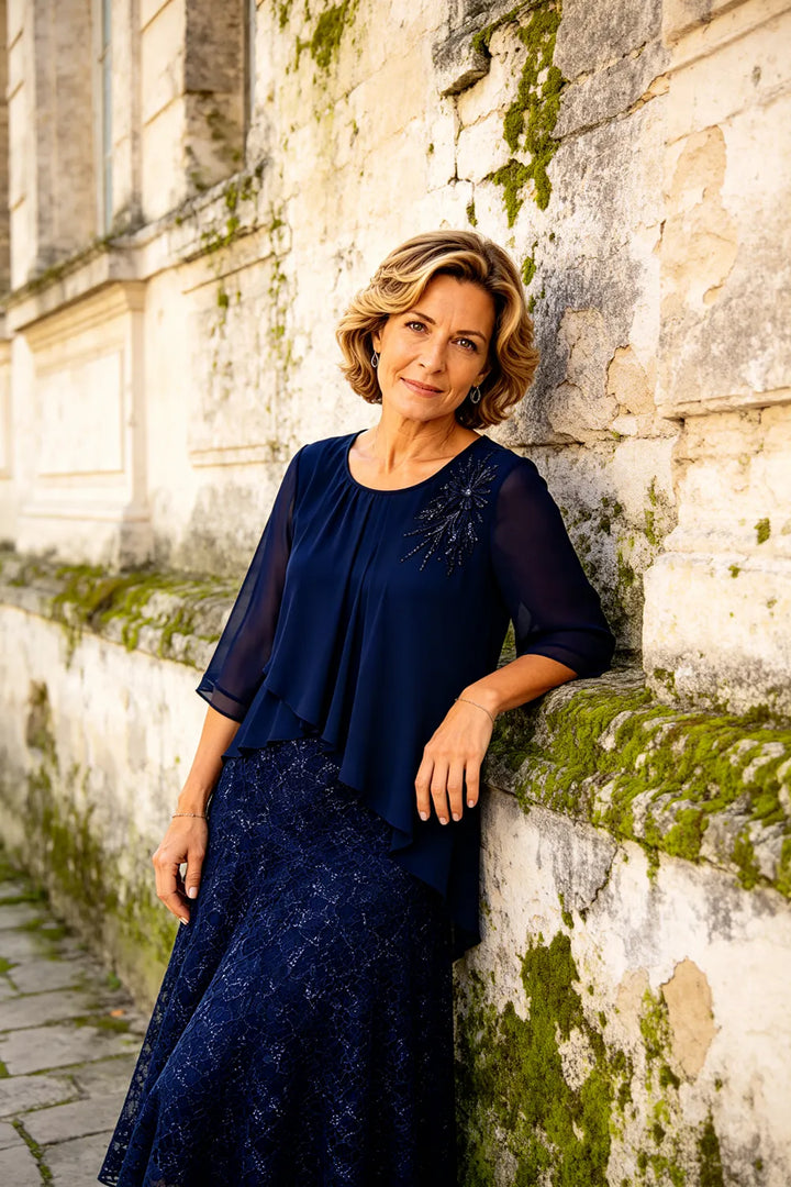 Lace mother of the bride dress in dark navy, outdoor shot